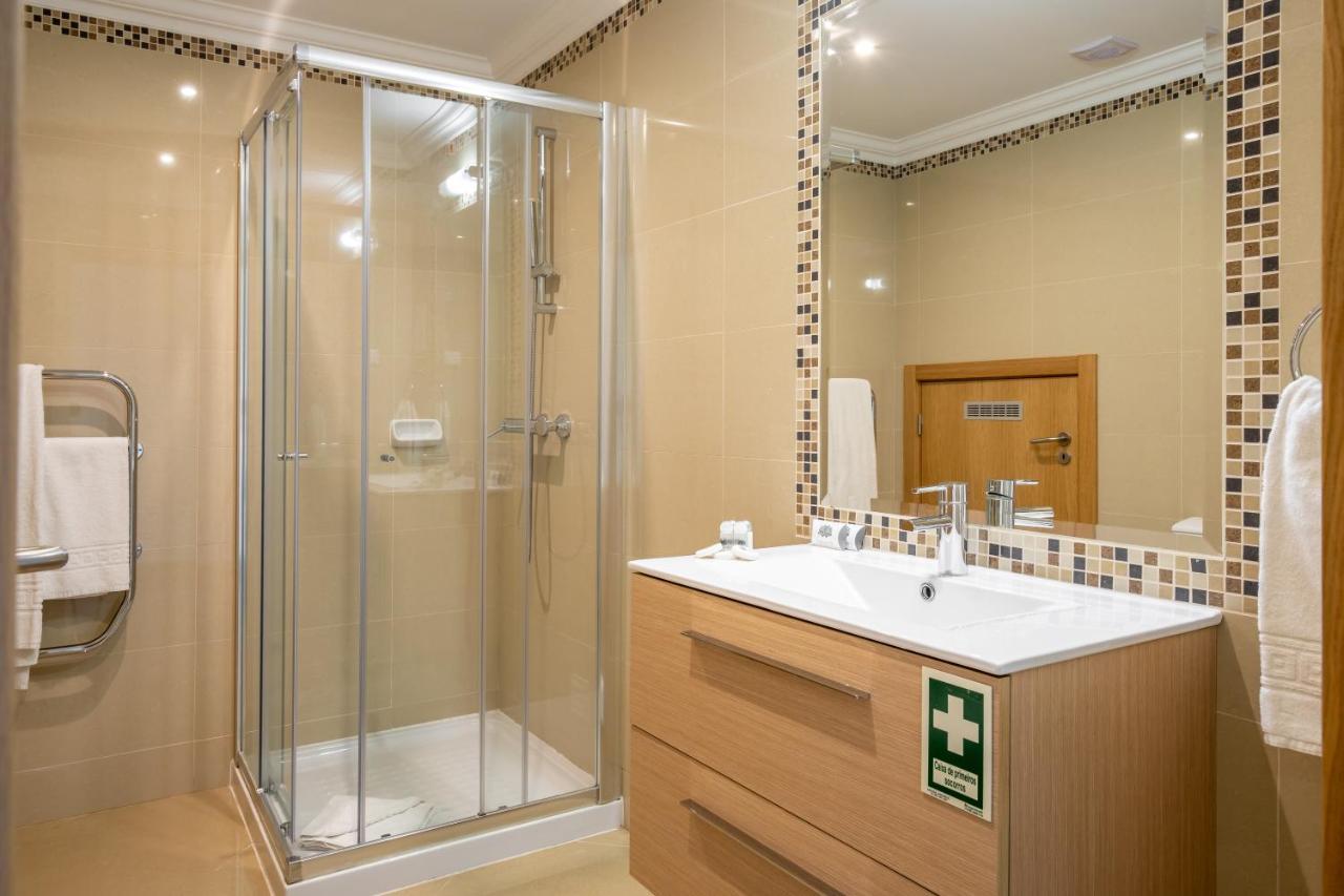 ボアヴィスタ ゴルフ&スパ リゾート ラゴス エクステリア 写真 Bathroom with shower cubicle